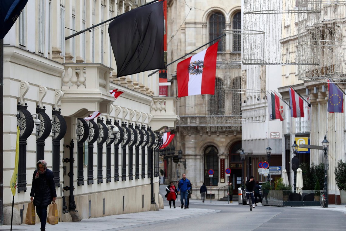 A black flag waves on a house downtown in Vienna, Austria, Wednesday, Nov. 4, 2020. Several shots were fired shortly after 8 p.m. local time on Monday, Nov. 2, in a lively street in the city center of Vienna. (AP Photo/Matthias Schrader) A black flag waves on a house downtown in Vienna, Austria, Wednesday, Nov. 4, 2020. Several shots were fired shortly after 8 p.m. local time on Monday, Nov. 2, in a lively street in the city center of Vienna. (AP Photo/Matthias Schrader)