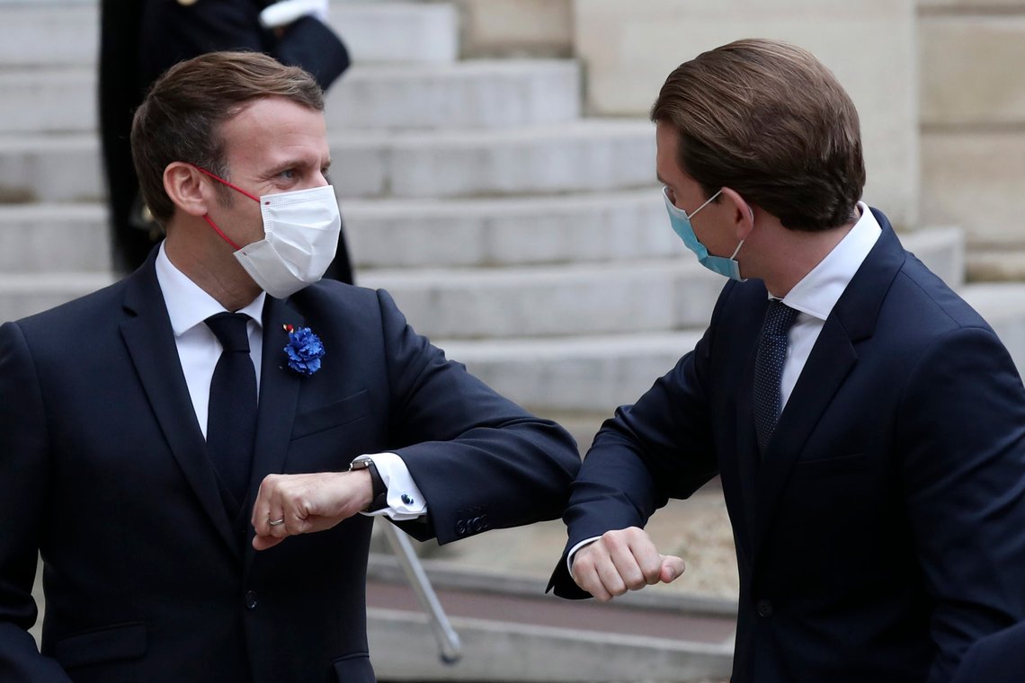 French President Emmanuel Macron, left, welcomes Austrian Chancellor Sebastian Kurz upon his arrival prior to their meeting at the Elysee Palace, in Paris, Tuesday, Nov. 10, 2020. The leaders of France, Germany, Austria and the EU are meeting Tuesday to discuss Europe's response to terrorism threats after a string of attacks. Macron and Kurz are meeting in person after both of their countries have lost lives to Islamic extremist attackers in recent weeks. (AP Photo/Michel Euler) French President Emmanuel Macron, left, welcomes Austrian Chancellor Sebastian Kurz upon his arrival prior to their meeting at the Elysee Palace, in Paris, Tuesday, Nov. 10, 2020. The leaders of France, Germany, Austria and the EU are meeting Tuesday to discuss Europe's response to terrorism threats after a string of attacks. Macron and Kurz are meeting in person after both of their countries have lost lives to Islamic extremist attackers in recent weeks. (AP Photo/Michel Euler)
