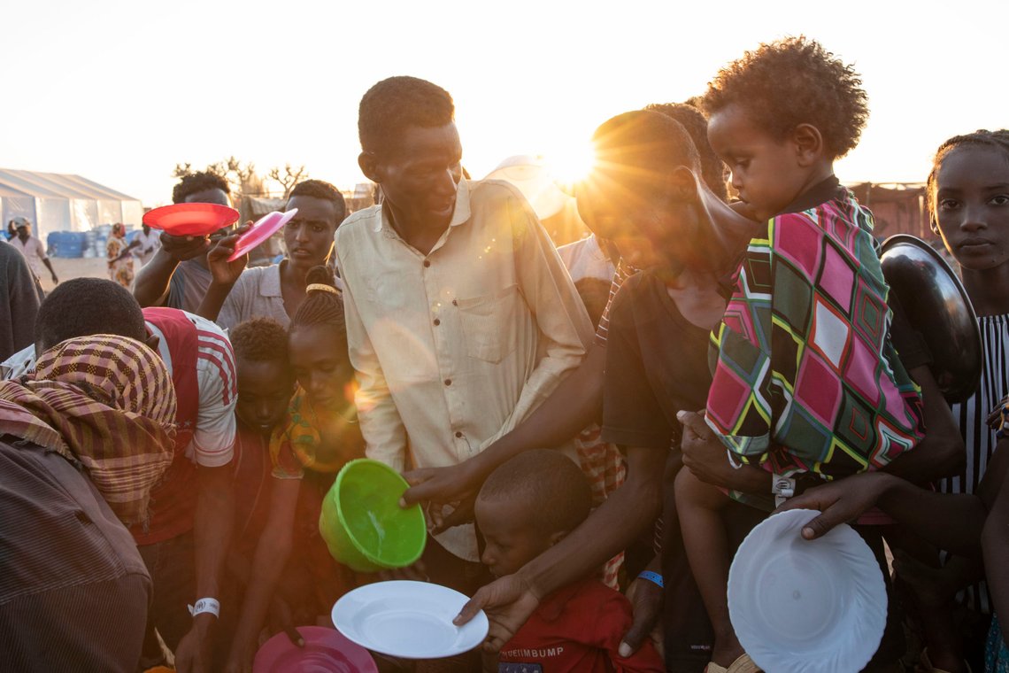 Tigray refugees who fled the conflict in Ethiopia's Tigray region, wait to get cooked rice served by Sudanese local volunteers at Um Rakuba refugee camp in Qadarif, eastern Sudan, Monday, Nov. 23, 2020. Tens of thousands of people have fled a conflict in Ethiopia for Sudan, sometimes so quickly they had to leave family behind. There is not enough to feed them in the remote area of southern Sudan that they rushed to. (AP Photo/Nariman El-Mofty) Tigray refugees who fled the conflict in Ethiopia's Tigray region, wait to get cooked rice served by Sudanese local volunteers at Um Rakuba refugee camp in Qadarif, eastern Sudan, Monday, Nov. 23, 2020. Tens of thousands of people have fled a conflict in Ethiopia for Sudan, sometimes so quickly they had to leave family behind. There is not enough to feed them in the remote area of southern Sudan that they rushed to. (AP Photo/Nariman El-Mofty)