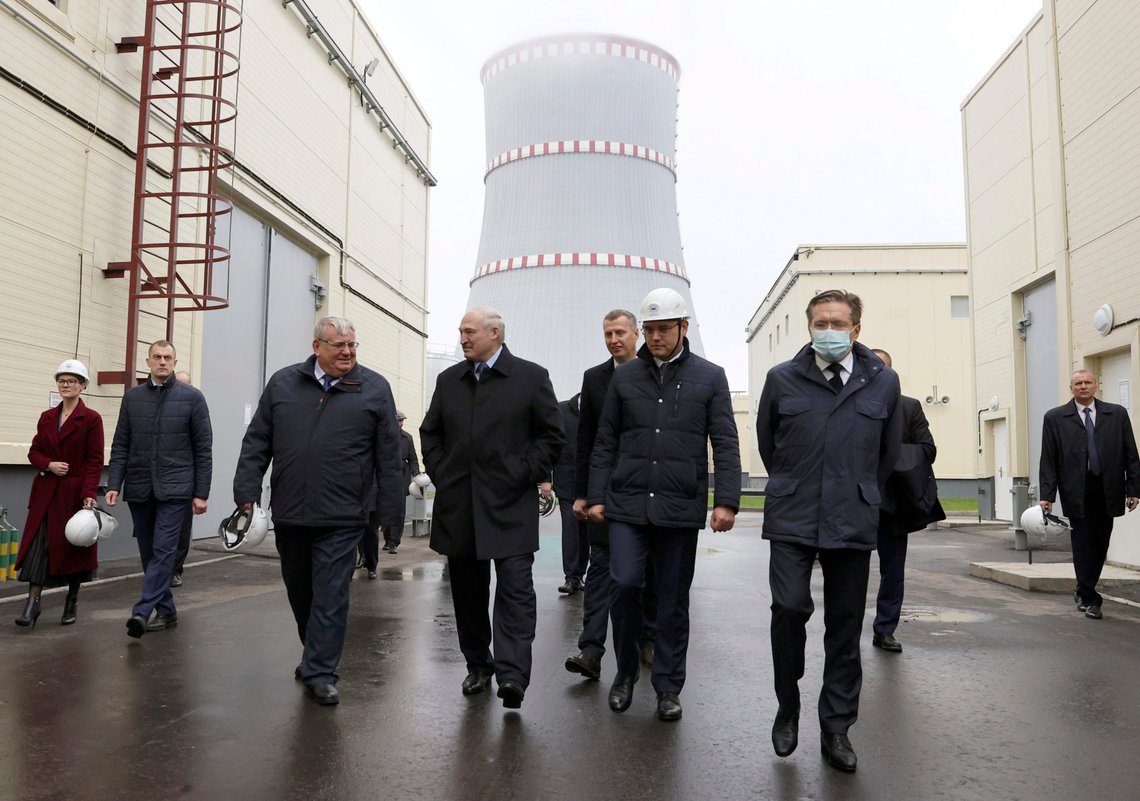 Belarusian President Alexander Lukashenko, centre, attends the first Belarusian Nuclear Power Plant during the plant's power launch event outside the city of Astravets, Belarus, Saturday, Nov. 7, 2020. Alexander Lukashenko on Saturday formally opened the country's first nuclear power plant, a project sharply criticized by neighboring Lithuania. Lukashenko said the launch of the Russian-built and -financed Astravyets plant "will serve as an impetus for attracting the most advanced technologies to the country and innovative directions in science and education." (Maxim Guchek/BelTA Pool Photo via AP) Belarusian President Alexander Lukashenko, centre, attends the first Belarusian Nuclear Power Plant during the plant's power launch event outside the city of Astravets, Belarus, Saturday, Nov. 7, 2020. Alexander Lukashenko on Saturday formally opened the country's first nuclear power plant, a project sharply criticized by neighboring Lithuania. Lukashenko said the launch of the Russian-built and -financed Astravyets plant "will serve as an impetus for attracting the most advanced technologies to the country and innovative directions in science and education." (Maxim Guchek/BelTA Pool Photo via AP)