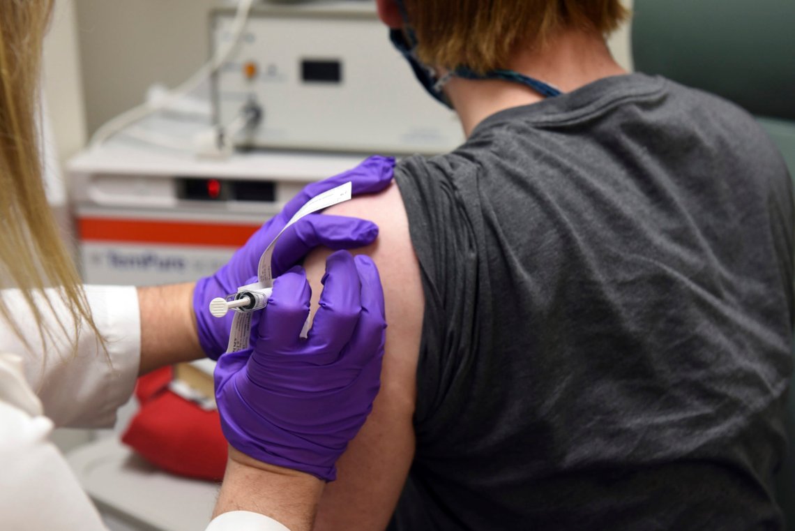 FILE - This May 4, 2020, file photo provided by the University of Maryland School of Medicine, shows the first patient enrolled in Pfizer's COVID-19 coronavirus vaccine clinical trial at the University of Maryland School of Medicine in Baltimore. On Monday, Nov. 9, 2020, Pfizer said an early peek at its vaccine data suggests the shots may be 90% effective at preventing COVID-19. (Courtesy of University of Maryland School of Medicine via AP, File) FILE - This May 4, 2020, file photo provided by the University of Maryland School of Medicine, shows the first patient enrolled in Pfizer's COVID-19 coronavirus vaccine clinical trial at the University of Maryland School of Medicine in Baltimore. On Monday, Nov. 9, 2020, Pfizer said an early peek at its vaccine data suggests the shots may be 90% effective at preventing COVID-19. (Courtesy of University of Maryland School of Medicine via AP, File)