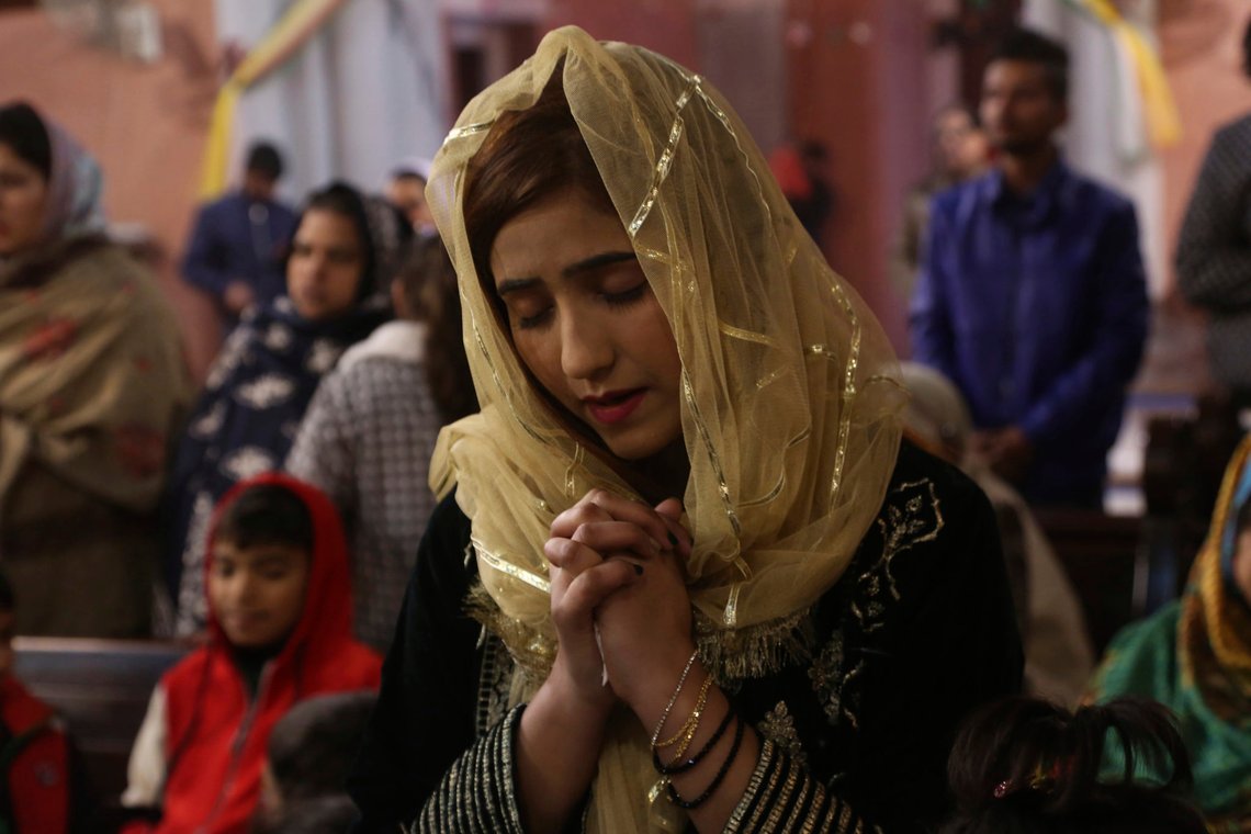 Pakistani Christians attend Christmas Mass at a church in Lahore, Pakistan, Wednesday, Dec. 25, 2019. (AP Photo/K.M. Chaudary) Pakistani Christians attend Christmas Mass at a church in Lahore, Pakistan, Wednesday, Dec. 25, 2019. (AP Photo/K.M. Chaudary)