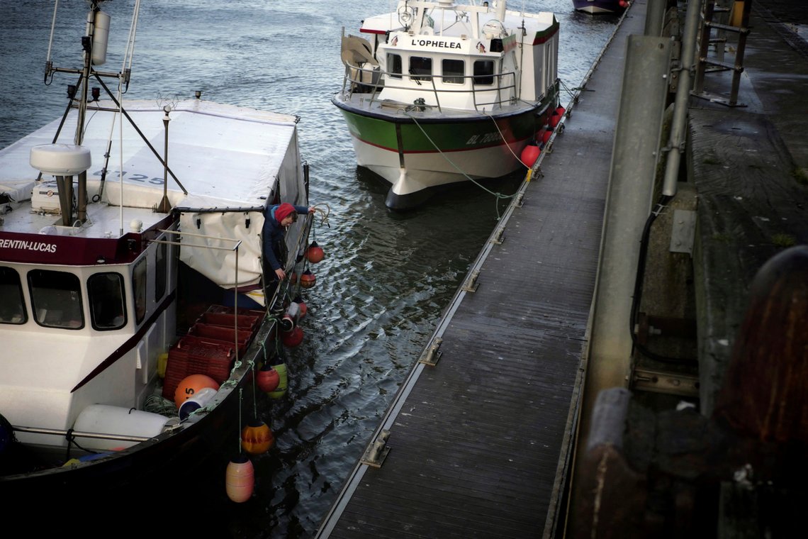 The Corentin-Lucas fishing boat arrives at the port of Boulogne-sur-Mer, northern France, Thursday, Dec. 10, 2020. Fishing rights are a sticking point in negotiations between the U.K. and the European Union about a post-Brexit trade deal. The EU has demanded widespread access to British fishing grounds that historically have been open to foreign trawlers. But in Britain, gaining control of the fishing grounds was a main issue for the Brexiteers who pushed for the country to leave the EU. (AP Photo/Thibault Camus) The Corentin-Lucas fishing boat arrives at the port of Boulogne-sur-Mer, northern France, Thursday, Dec. 10, 2020. Fishing rights are a sticking point in negotiations between the U.K. and the European Union about a post-Brexit trade deal. The EU has demanded widespread access to British fishing grounds that historically have been open to foreign trawlers. But in Britain, gaining control of the fishing grounds was a main issue for the Brexiteers who pushed for the country to leave the EU. (AP Photo/Thibault Camus)