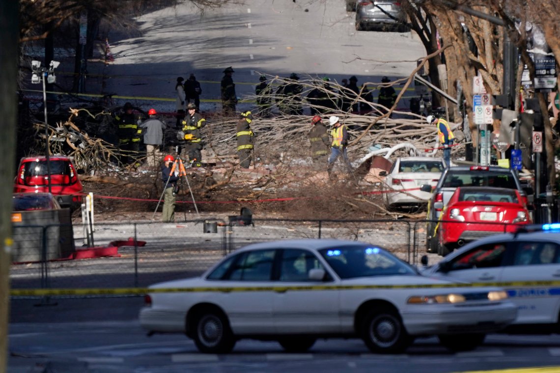 Investigators continue to examine the site of an explosion Sunday, Dec. 27, 2020, in downtown Nashville, Tenn. An explosion that shook the largely deserted streets of downtown Nashville early Christmas morning shattered windows, damaged buildings and wounded multiple people. Authorities said they believed the blast was intentional. (AP Photo/Mark Humphrey) Investigators continue to examine the site of an explosion Sunday, Dec. 27, 2020, in downtown Nashville, Tenn. An explosion that shook the largely deserted streets of downtown Nashville early Christmas morning shattered windows, damaged buildings and wounded multiple people. Authorities said they believed the blast was intentional. (AP Photo/Mark Humphrey)