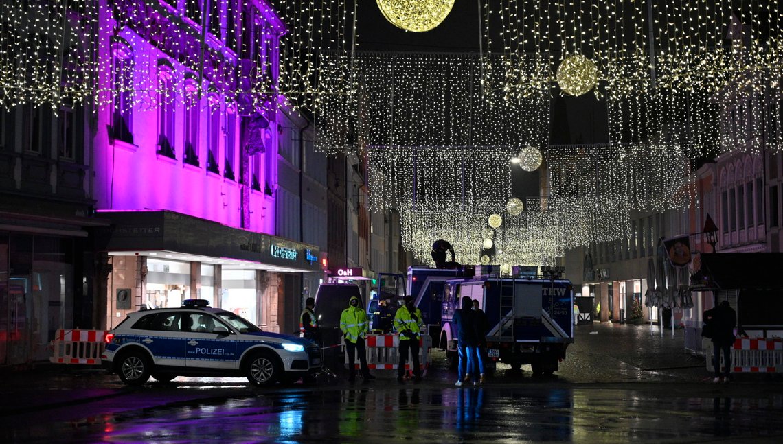 Police officers and firefighters stay together at the scene of an incident in Trier, Germany, Tuesday, Dec. 1, 2020. German police say people have been killed and several others injured in the southwestern German city of Trier when a car drove into a pedestrian zone. Trier police tweeted that the driver had been arrested and the vehicle impounded. (Harald Tittel/dpa via AP) Police officers and firefighters stay together at the scene of an incident in Trier, Germany, Tuesday, Dec. 1, 2020. German police say people have been killed and several others injured in the southwestern German city of Trier when a car drove into a pedestrian zone. Trier police tweeted that the driver had been arrested and the vehicle impounded. (Harald Tittel/dpa via AP)