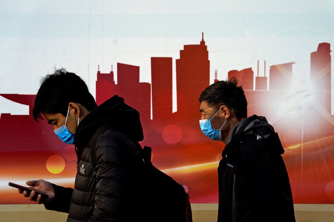 People wearing face masks to help curb the spread of the coronavirus walk by a moral depicting China's skyscrapers along a street in Beijing, Sunday, Dec. 6, 2020. Provincial governments across China are placing orders for experimental, domestically made coronavirus vaccines, though health officials have yet to say how well they work or how they may reach the country's 1.4 billion people. (AP Photo/Andy Wong) People wearing face masks to help curb the spread of the coronavirus walk by a moral depicting China's skyscrapers along a street in Beijing, Sunday, Dec. 6, 2020. Provincial governments across China are placing orders for experimental, domestically made coronavirus vaccines, though health officials have yet to say how well they work or how they may reach the country's 1.4 billion people. (AP Photo/Andy Wong)
