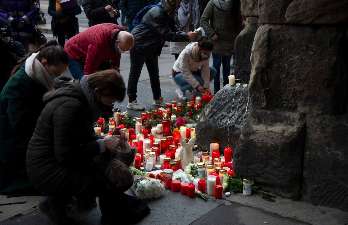 Mourners lay down candles and flowers at the Porta Nigra in Trier the morning after the amok drive with five dead people in Trier, Germany, Wednesday, Dec.3, 2020. Numerous people commemorate the victims of the amok drive of a 51-year-old man through the city centre. (Harald Tittel/dpa via AP) Mourners lay down candles and flowers at the Porta Nigra in Trier the morning after the amok drive with five dead people in Trier, Germany, Wednesday, Dec.3, 2020. Numerous people commemorate the victims of the amok drive of a 51-year-old man through the city centre. (Harald Tittel/dpa via AP)