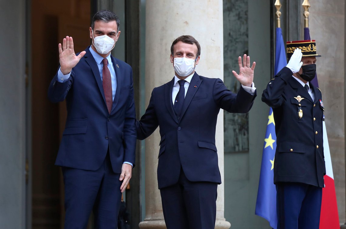 France's President Emmanuel Macron, left, welcomes European Council Spain's Prime Minister Pedro Sanchez for a working lunch at the Elysee Palace in Paris, Monday, Dec. 14, 2020, after a ceremony marking the 60th anniversary of the signature of the Organisation for Economic Co-operation and Development (OECD) Convention. (AP Photo/Michel Euler) France's President Emmanuel Macron, left, welcomes European Council Spain's Prime Minister Pedro Sanchez for a working lunch at the Elysee Palace in Paris, Monday, Dec. 14, 2020, after a ceremony marking the 60th anniversary of the signature of the Organisation for Economic Co-operation and Development (OECD) Convention. (AP Photo/Michel Euler)