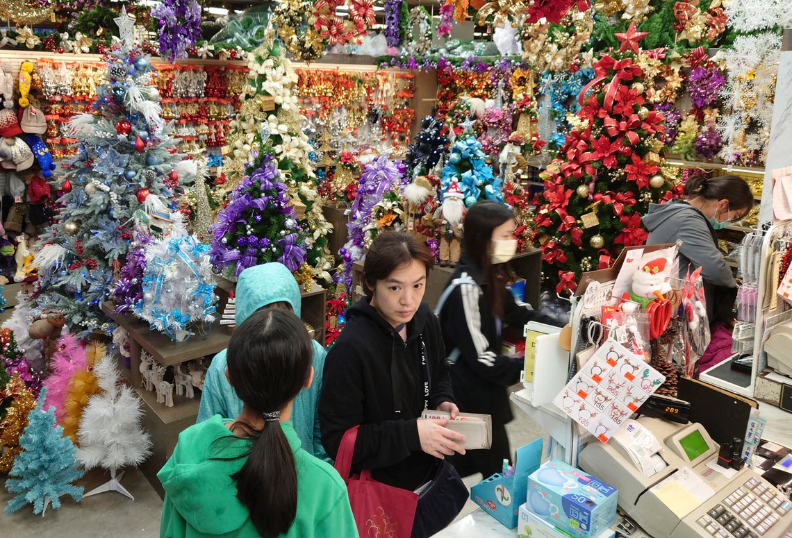 People shop at a Christmas decoration shop in Taipei, Taiwan, Saturday, Dec. 19, 2020. (AP Photo/Chiang Ying-ying) People shop at a Christmas decoration shop in Taipei, Taiwan, Saturday, Dec. 19, 2020. (AP Photo/Chiang Ying-ying)