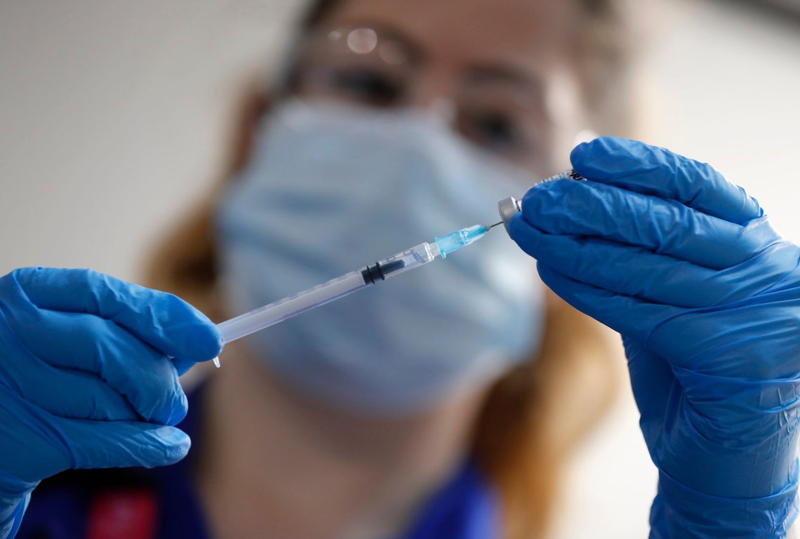 A nurse prepares a shot of the Pfizer-BioNTech COVID-19 vaccine at Guy's Hospital in London, Tuesday, Dec. 8, 2020, as the U.K. health authorities rolled out a national mass vaccination program. U.K. regulators said Wednesday Dec. 9, 2020, that people who have a significant history of allergic reactions shouldnt receive the new Pfizer/BioNTech vaccine while they investigate two adverse reactions that occurred on the first day of the countrys mass vaccination program. (AP Photo/Frank Augstein, Pool) A nurse prepares a shot of the Pfizer-BioNTech COVID-19 vaccine at Guy's Hospital in London, Tuesday, Dec. 8, 2020, as the U.K. health authorities rolled out a national mass vaccination program. U.K. regulators said Wednesday Dec. 9, 2020, that people who have a significant history of allergic reactions shouldnt receive the new Pfizer/BioNTech vaccine while they investigate two adverse reactions that occurred on the first day of the countrys mass vaccination program. (AP Photo/Frank Augstein, Pool)