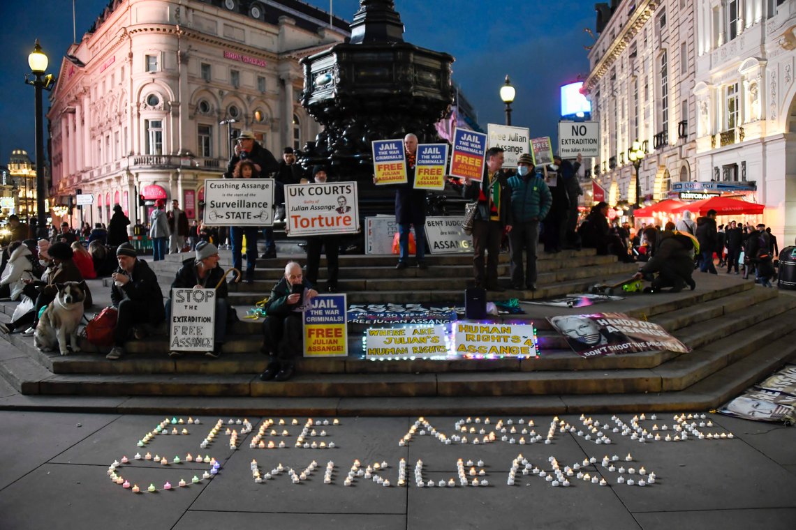 Demonstrators gather in Piccadilly Circus in London, Saturday, Dec. 12, 2020, in support of Wikileaks founder Julian Assange, during his extradition case. (AP Photo/Alberto Pezzali) Demonstrators gather in Piccadilly Circus in London, Saturday, Dec. 12, 2020, in support of Wikileaks founder Julian Assange, during his extradition case. (AP Photo/Alberto Pezzali)