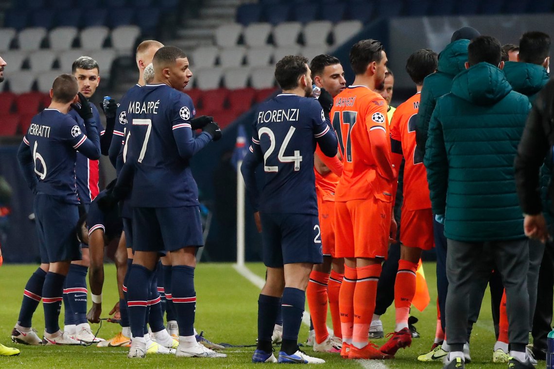 Players of Paris Saint Germain, and Istanbul Basaksehir leave the pitch, during the Champions League group H soccer match between Paris Saint Germain and Istanbul Basaksehir at the Parc des Princes stadium in Paris, Tuesday Dec. 8 , 2020. Basaksehir's assistant coach Pierre Webo was shown a straight red card in the 16th minute before the players refused to continue the match amid allegations of racism by one of the match officials. (AP Photo/Francois Mori) Players of Paris Saint Germain, and Istanbul Basaksehir leave the pitch, during the Champions League group H soccer match between Paris Saint Germain and Istanbul Basaksehir at the Parc des Princes stadium in Paris, Tuesday Dec. 8 , 2020. Basaksehir's assistant coach Pierre Webo was shown a straight red card in the 16th minute before the players refused to continue the match amid allegations of racism by one of the match officials. (AP Photo/Francois Mori)