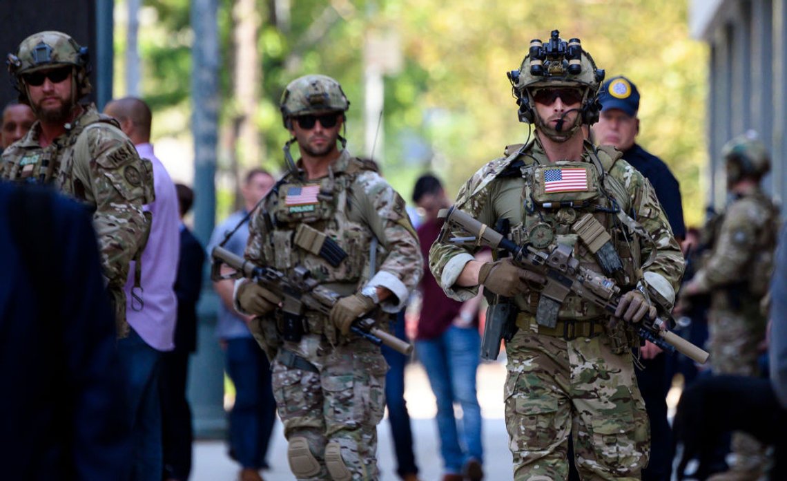 US Marshal security police stand out at the Brooklyn Federal Court on July 17, 2019, after Mexican drug lord Joaquin "El Chapo" Guzman's sentencing, in New York city. - Once one of the world's most powerful and notorious criminals, Mexican drug lord Joaquin "El Chapo" Guzman was jailed for life Wednesday -- the mandatory sentence for a host of crimes spanning a quarter-century. Guzman, the 62-year-old former co-leader of Mexico's mighty Sinaloa drug cartel, was convicted in February in US federal court on a variety of charges, including trafficking hundreds of tons of cocaine, heroin, methamphetamines and marijuana to the United States. (Photo by Johannes EISELE / AFP) (Photo credit should read JOHANNES EISELE/AFP via Getty Images) US Marshal security police stand out at the Brooklyn Federal Court on July 17, 2019, after Mexican drug lord Joaquin "El Chapo" Guzman's sentencing, in New York city. - Once one of the world's most powerful and notorious criminals, Mexican drug lord Joaquin "El Chapo" Guzman was jailed for life Wednesday -- the mandatory sentence for a host of crimes spanning a quarter-century. Guzman, the 62-year-old former co-leader of Mexico's mighty Sinaloa drug cartel, was convicted in February in US federal court on a variety of charges, including trafficking hundreds of tons of cocaine, heroin, methamphetamines and marijuana to the United States. (Photo by Johannes EISELE / AFP) (Photo credit should read JOHANNES EISELE/AFP via Getty Images)