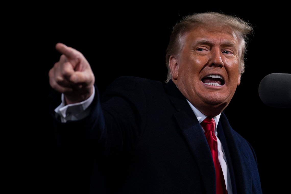 President Donald Trump speaks during a campaign rally for Senate Republican candidates, Sen. Kelly Loeffler, R-Ga., and Sen. David Perdue, R-Ga., at Valdosta Regional Airport, Saturday, Dec. 5, 2020, in Valdosta, Ga. (AP Photo/Evan Vucci) President Donald Trump speaks during a campaign rally for Senate Republican candidates, Sen. Kelly Loeffler, R-Ga., and Sen. David Perdue, R-Ga., at Valdosta Regional Airport, Saturday, Dec. 5, 2020, in Valdosta, Ga. (AP Photo/Evan Vucci)