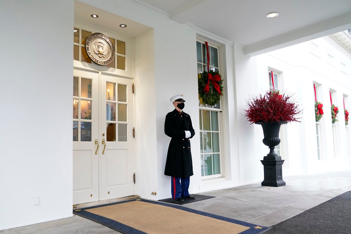 A marine stands outside the West Wing of the White House in Washington, Wednesday, Dec. 16, 2020. (AP Photo/Susan Walsh) A marine stands outside the West Wing of the White House in Washington, Wednesday, Dec. 16, 2020. (AP Photo/Susan Walsh)