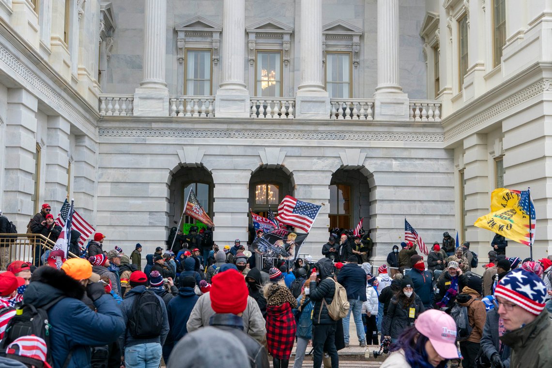 Supporters of President Donald Trump try to open a door of the U.S. Capitol on Wednesday, Jan. 6, 2021, in Washington. (AP Photo/Jose Luis Magana) Supporters of President Donald Trump try to open a door of the U.S. Capitol on Wednesday, Jan. 6, 2021, in Washington. (AP Photo/Jose Luis Magana)