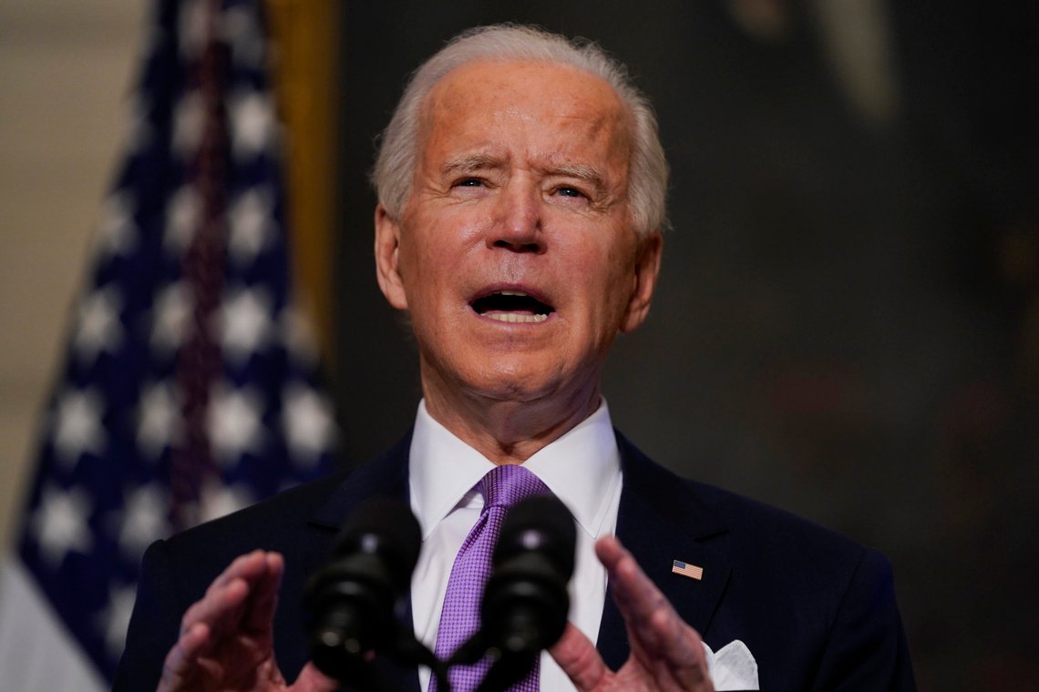 President Joe Biden delivers remarks on COVID-19, in the State Dining Room of the White House, Tuesday, Jan. 26, 2021, in Washington. (AP Photo/Evan Vucci) President Joe Biden delivers remarks on COVID-19, in the State Dining Room of the White House, Tuesday, Jan. 26, 2021, in Washington. (AP Photo/Evan Vucci)