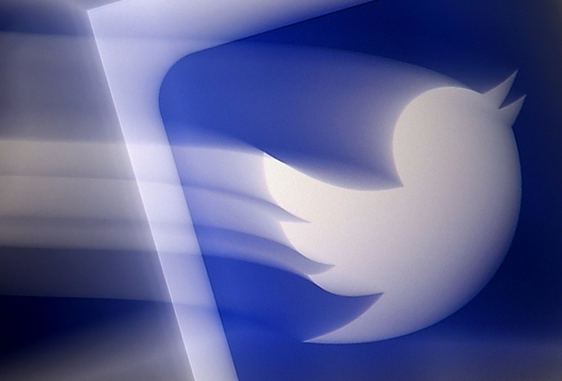 (FILES) In this file photo illustration taken on August 10, 2020 shows a Twitter logo displayed on a mobile phone in Arlington, Virginia. - As US President Joe Biden took office on January 20, 2021, Twitter handed him the reins of an official @POTUS account as part of the transfer of power. The one-to-many messaging service gave Biden's team control of all the official White House accounts, and activated a new @SecondGentleman handle for the husband of the country's first female vice president Kamala Harris. (Photo by Olivier DOULIERY / AFP) (FILES) In this file photo illustration taken on August 10, 2020 shows a Twitter logo displayed on a mobile phone in Arlington, Virginia. - As US President Joe Biden took office on January 20, 2021, Twitter handed him the reins of an official @POTUS account as part of the transfer of power. The one-to-many messaging service gave Biden's team control of all the official White House accounts, and activated a new @SecondGentleman handle for the husband of the country's first female vice president Kamala Harris. (Photo by Olivier DOULIERY / AFP)