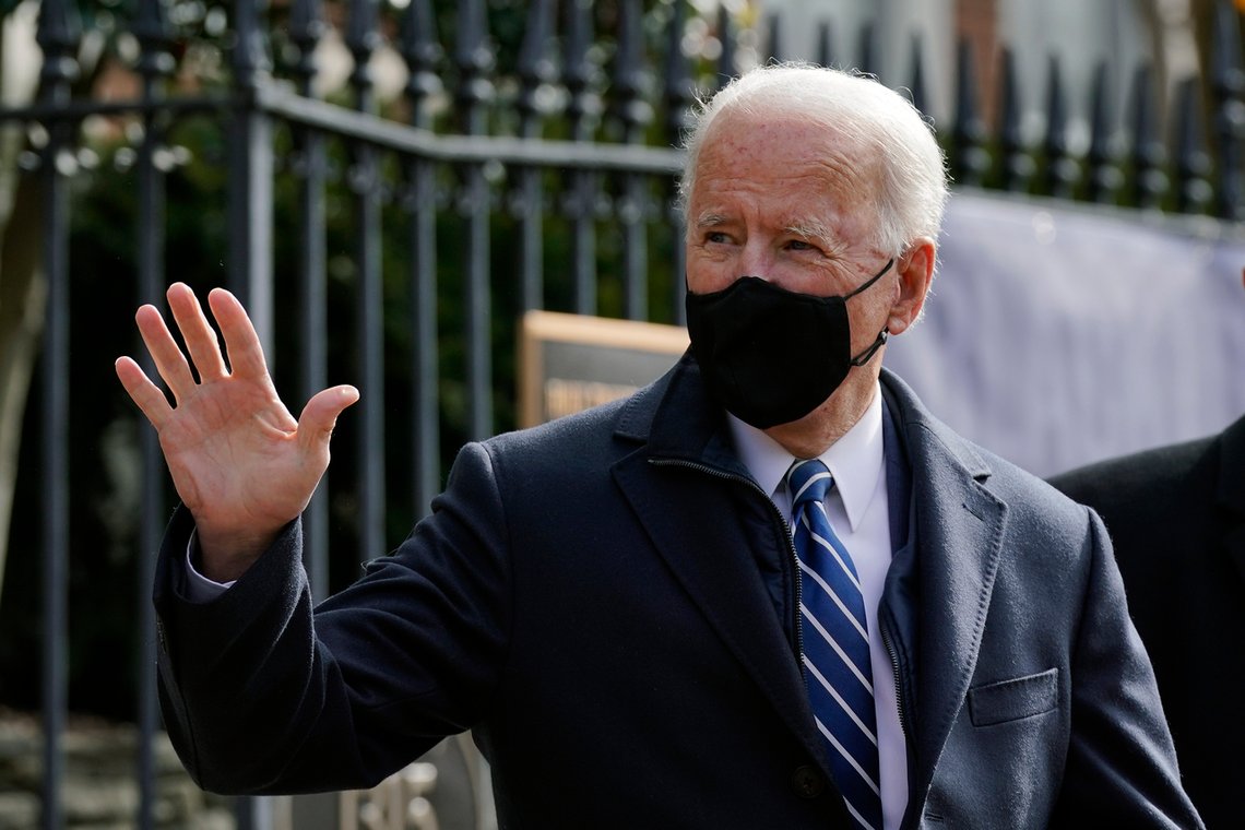 President Joe Biden waves as he departs after attending Mass at Holy Trinity Catholic Church, Sunday, Jan. 24, 2021, in the Georgetown neighborhood of Washington. Biden plans to sign an executive order Monday, Jan. 25 that aims to boost government purchases from U.S. manufacturers. (AP Photo/Patrick Semansky) President Joe Biden waves as he departs after attending Mass at Holy Trinity Catholic Church, Sunday, Jan. 24, 2021, in the Georgetown neighborhood of Washington. Biden plans to sign an executive order Monday, Jan. 25 that aims to boost government purchases from U.S. manufacturers. (AP Photo/Patrick Semansky)