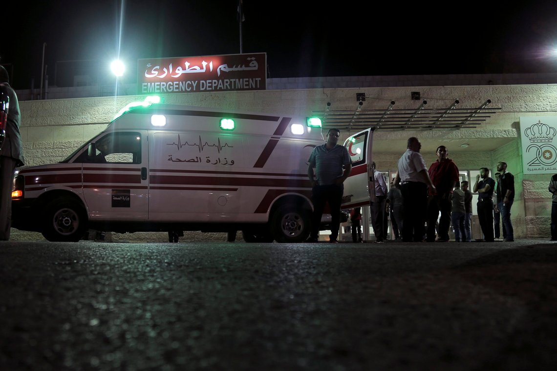 FILE - In this Nov. 6, 2019 file photo, an ambulance is parked in front of the Jerash Government Hospital, where people stabbed in a knife attack were taken in Jerash, Jordan. On Tuesday, Jan. 12, 2021, Jordan sentenced a man to death by hanging for the 2019 stabbing attack at a popular tourist site that wounded eight people, including foreign tourists and their guide. (AP Photo/Raad Adayleh, File) FILE - In this Nov. 6, 2019 file photo, an ambulance is parked in front of the Jerash Government Hospital, where people stabbed in a knife attack were taken in Jerash, Jordan. On Tuesday, Jan. 12, 2021, Jordan sentenced a man to death by hanging for the 2019 stabbing attack at a popular tourist site that wounded eight people, including foreign tourists and their guide. (AP Photo/Raad Adayleh, File)