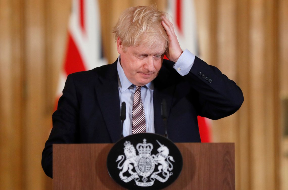 FILE - In this Tuesday, March 3, 2020 file photo Britain's Prime Minister Boris Johnson reacts during a press conference at Downing Street on the government's coronavirus action plan in London. More than 100,000 people have died in the United Kingdom after contracting the coronavirus. That's according to government figures released Tuesday Jan. 26, 2021. Britain is the fifth country in the world to pass that mark, after the United States, Brazil, India and Mexico, and by far the smallest. The U.S. has recorded more than 400,000 COVID-19 deaths, the world's highest total, but its population of about 330 million is about five times Britain's. (AP Photo/Frank Augstein, File) FILE - In this Tuesday, March 3, 2020 file photo Britain's Prime Minister Boris Johnson reacts during a press conference at Downing Street on the government's coronavirus action plan in London. More than 100,000 people have died in the United Kingdom after contracting the coronavirus. That's according to government figures released Tuesday Jan. 26, 2021. Britain is the fifth country in the world to pass that mark, after the United States, Brazil, India and Mexico, and by far the smallest. The U.S. has recorded more than 400,000 COVID-19 deaths, the world's highest total, but its population of about 330 million is about five times Britain's. (AP Photo/Frank Augstein, File)