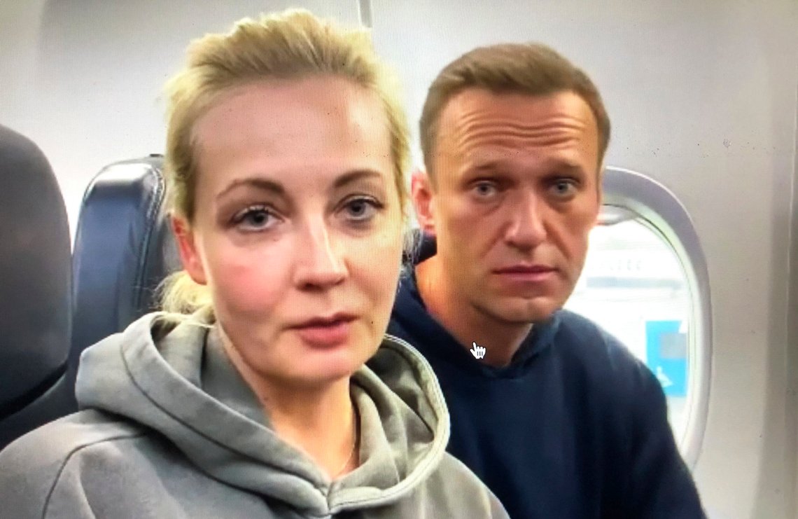 In this grab taken from video posted on his instagram account, Alexei Navalny and his wife Yulia onboard a flight to Moscow, at the Airport Berlin Brandenburg (BER) in Schoenefeld, near Berlin, Germany, Sunday, Jan. 17, 2021. Leading Kremlin critic Alexei Navalny flew home to Russia on Sunday after recovering in Germany from his poisoning in August with a nerve agent. (Alexei Navalny Instagram account via AP) In this grab taken from video posted on his instagram account, Alexei Navalny and his wife Yulia onboard a flight to Moscow, at the Airport Berlin Brandenburg (BER) in Schoenefeld, near Berlin, Germany, Sunday, Jan. 17, 2021. Leading Kremlin critic Alexei Navalny flew home to Russia on Sunday after recovering in Germany from his poisoning in August with a nerve agent. (Alexei Navalny Instagram account via AP)