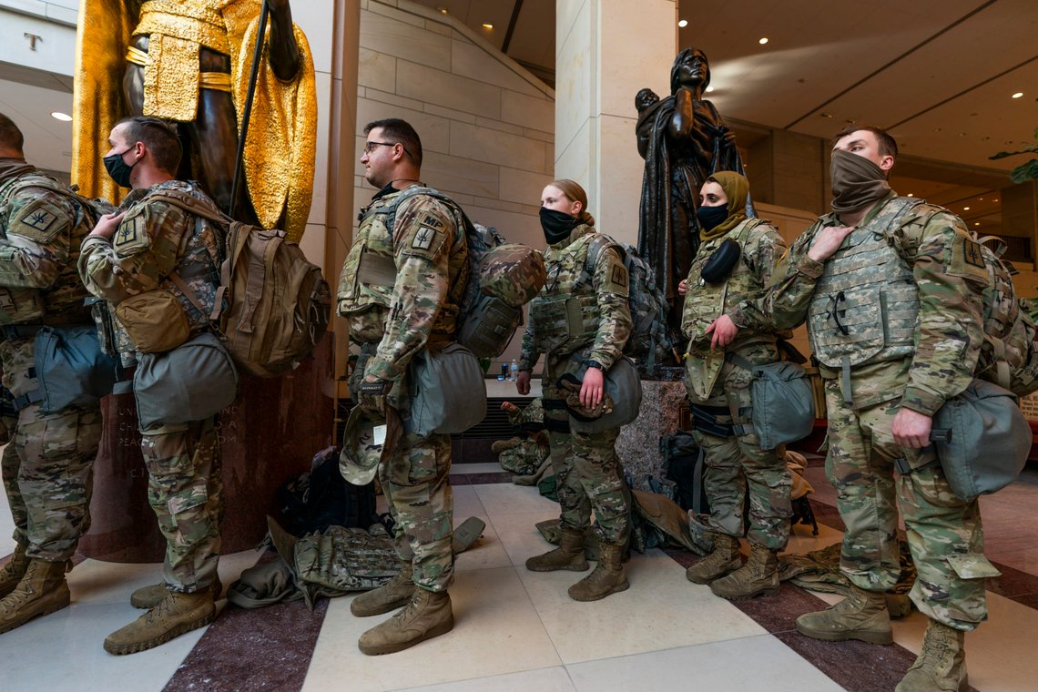 Members of the National Guard gather at inside the Capitol Visitor Center, Wednesday, Jan. 13, 2021, in Washington as the House of Representatives continues with its fast-moving House vote to impeach President Donald Trump, a week after a mob of Trump supporters stormed the U.S. Capitol. (AP Photo/Manuel Balce Ceneta) Members of the National Guard gather at inside the Capitol Visitor Center, Wednesday, Jan. 13, 2021, in Washington as the House of Representatives continues with its fast-moving House vote to impeach President Donald Trump, a week after a mob of Trump supporters stormed the U.S. Capitol. (AP Photo/Manuel Balce Ceneta)