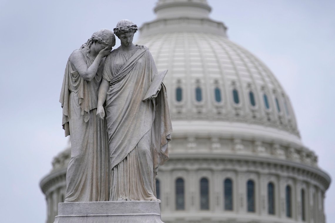 The Peace Monument, also known as the Naval Monument or Civil War Sailors Monument, is framed by the Capitol dome on Capitol Hill in Washington, Monday, Jan. 4, 2021. Protests are planned on January 6, the day when Congress is scheduled to meet to formally finalize the presidential election results. (AP Photo/Susan Walsh) The Peace Monument, also known as the Naval Monument or Civil War Sailors Monument, is framed by the Capitol dome on Capitol Hill in Washington, Monday, Jan. 4, 2021. Protests are planned on January 6, the day when Congress is scheduled to meet to formally finalize the presidential election results. (AP Photo/Susan Walsh)