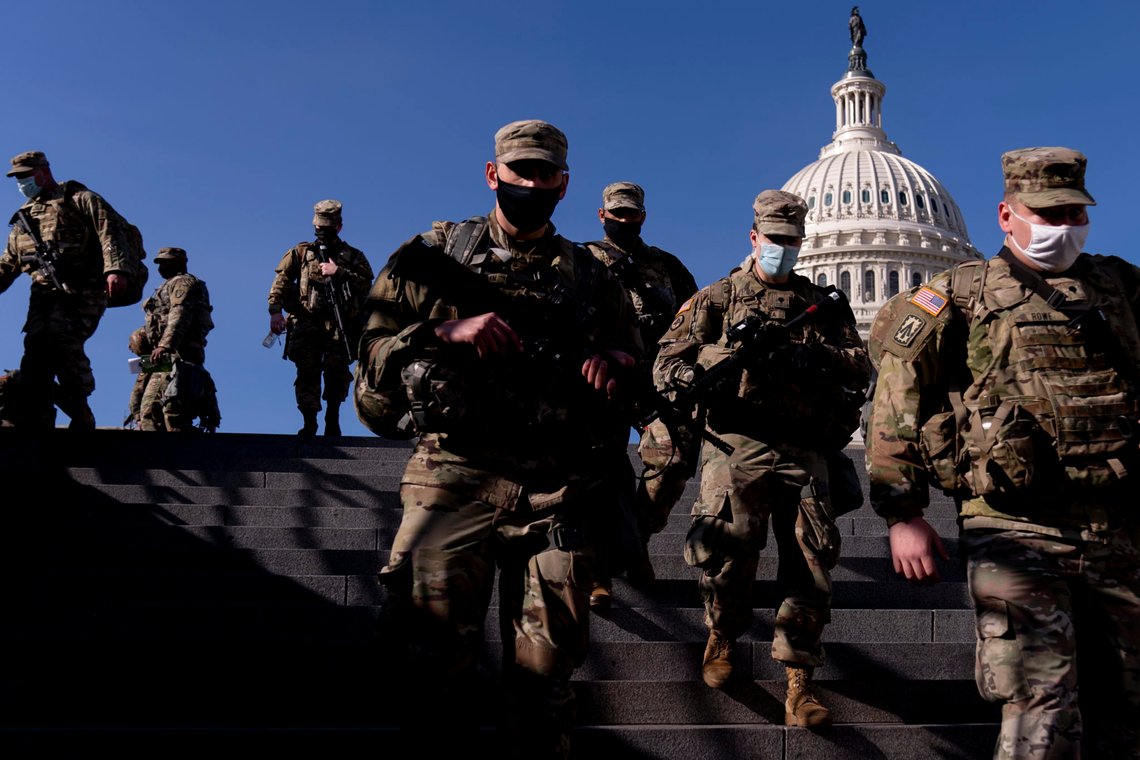 Members of the National Guard walk past the dome of the Capitol Building on Capitol Hill in Washington, Thursday, Jan. 14, 2021. (AP Photo/Andrew Harnik) Members of the National Guard walk past the dome of the Capitol Building on Capitol Hill in Washington, Thursday, Jan. 14, 2021. (AP Photo/Andrew Harnik)
