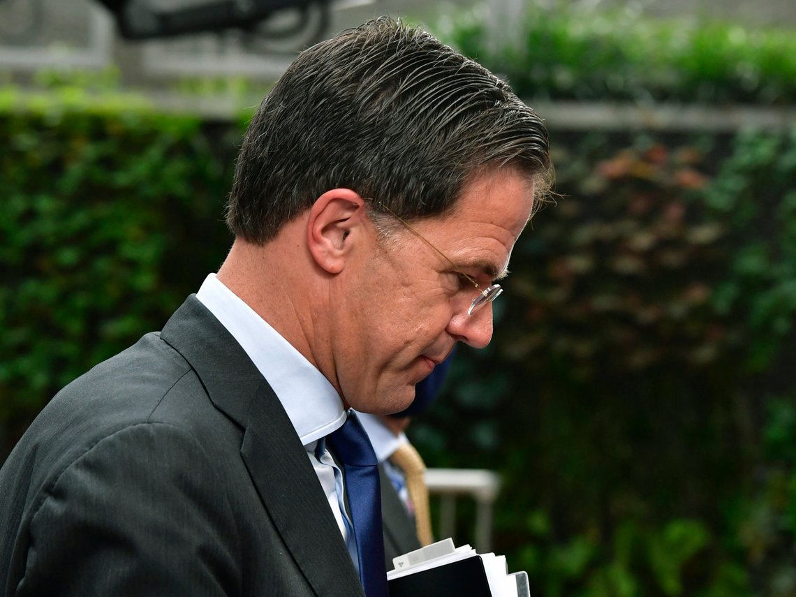 FILE In this Sunday, July 19, 2020 file photo, Netherlands' Prime Minister Mark Rutte arrives for an EU summit at the European Council building in Brussels. A Dutch parliamentary commission issued a damning report Thursday, Dec. 17, 2020 into a scandal in which thousands of parents were wrongly labeled fraudsters by government officials assessing claims for child benefit payments. The report titled Unprecedented Injustice was issued following an investigation by a parliamentary committee and public questioning of officials up to and including Prime Minister Mark Rutte into the scandal. (John Thys, Pool Photo via AP, File) FILE In this Sunday, July 19, 2020 file photo, Netherlands' Prime Minister Mark Rutte arrives for an EU summit at the European Council building in Brussels. A Dutch parliamentary commission issued a damning report Thursday, Dec. 17, 2020 into a scandal in which thousands of parents were wrongly labeled fraudsters by government officials assessing claims for child benefit payments. The report titled Unprecedented Injustice was issued following an investigation by a parliamentary committee and public questioning of officials up to and including Prime Minister Mark Rutte into the scandal. (John Thys, Pool Photo via AP, File)