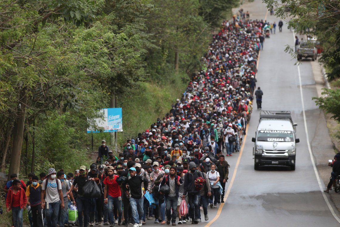 Migrants hoping to reach the U.S. border walk alongside a highway in Chiquimula, Guatemala, Saturday, Jan. 16, 2021. Honduran migrants pushed their way into Guatemala Friday night without registering, a portion of a larger migrant caravan that had left the Honduran city of San Pedro Sula before dawn, Guatemalan authorities said. (AP Photo/Sandra Sebastian) Migrants hoping to reach the U.S. border walk alongside a highway in Chiquimula, Guatemala, Saturday, Jan. 16, 2021. Honduran migrants pushed their way into Guatemala Friday night without registering, a portion of a larger migrant caravan that had left the Honduran city of San Pedro Sula before dawn, Guatemalan authorities said. (AP Photo/Sandra Sebastian)
