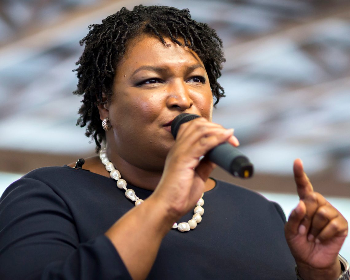 Georgia Democratic gubernatorial candidate Stacey Abrams speaks to supporters at a rally, Monday, Nov., 5, 2018, in Richmond Hill, Ga. Republican candidate Brian Kemp and Abrams are locked in a tight race that could head to a runoff if neither wins a majority Tuesday. (AP Photo/Stephen B. Morton) Georgia Democratic gubernatorial candidate Stacey Abrams speaks to supporters at a rally, Monday, Nov., 5, 2018, in Richmond Hill, Ga. Republican candidate Brian Kemp and Abrams are locked in a tight race that could head to a runoff if neither wins a majority Tuesday. (AP Photo/Stephen B. Morton)