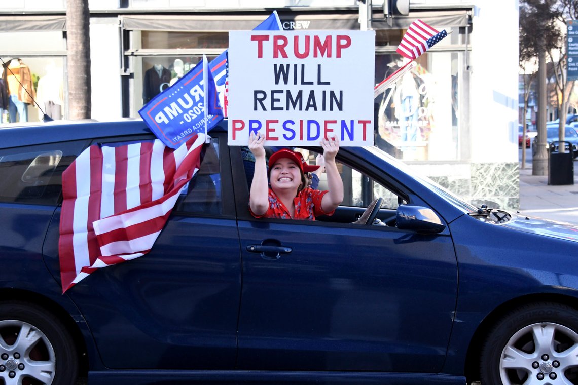 Trump supporters parade along the Rose Parade route on Colorado Blvd in Pasadena, Calif., on Friday, Jan. 1, 2021. (Keith Birmingham/The Orange County Register via AP) Trump supporters parade along the Rose Parade route on Colorado Blvd in Pasadena, Calif., on Friday, Jan. 1, 2021. (Keith Birmingham/The Orange County Register via AP)