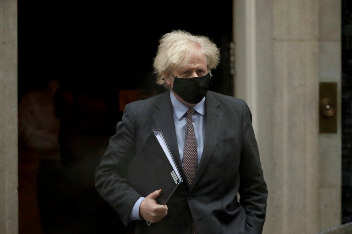 British Prime Minister Boris Johnson leaves 10 Downing Street to go to the Houses of Parliament, in London, Monday, Feb. 22, 2021. Johnson on Monday is expected to announce a plan to ease coronavirus restrictions in increments, starting by reopening schools in England on March 8. (AP Photo/Matt Dunham) British Prime Minister Boris Johnson leaves 10 Downing Street to go to the Houses of Parliament, in London, Monday, Feb. 22, 2021. Johnson on Monday is expected to announce a plan to ease coronavirus restrictions in increments, starting by reopening schools in England on March 8. (AP Photo/Matt Dunham)