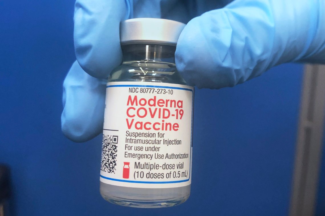A vial of Moderna COVID-19 vaccine is held at a vaccination site Friday, Feb. 19, 2021, in Oklahoma City. (AP Photo/Sue Ogrocki) A vial of Moderna COVID-19 vaccine is held at a vaccination site Friday, Feb. 19, 2021, in Oklahoma City. (AP Photo/Sue Ogrocki)