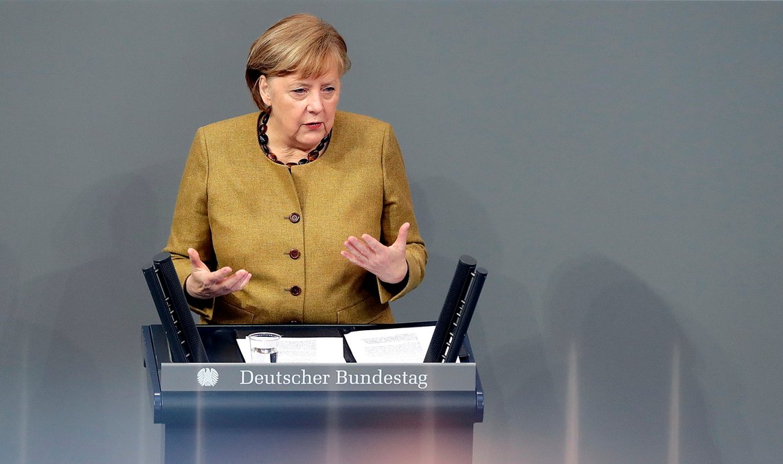 German Chancellor Angela Merkel delivers a speech during a meeting of the German federal parliament, Bundestag, at the Reichstag building in Berlin, Germany, Thursday, Feb. 11, 2021. (AP Photo/Michael Sohn) German Chancellor Angela Merkel delivers a speech during a meeting of the German federal parliament, Bundestag, at the Reichstag building in Berlin, Germany, Thursday, Feb. 11, 2021. (AP Photo/Michael Sohn)