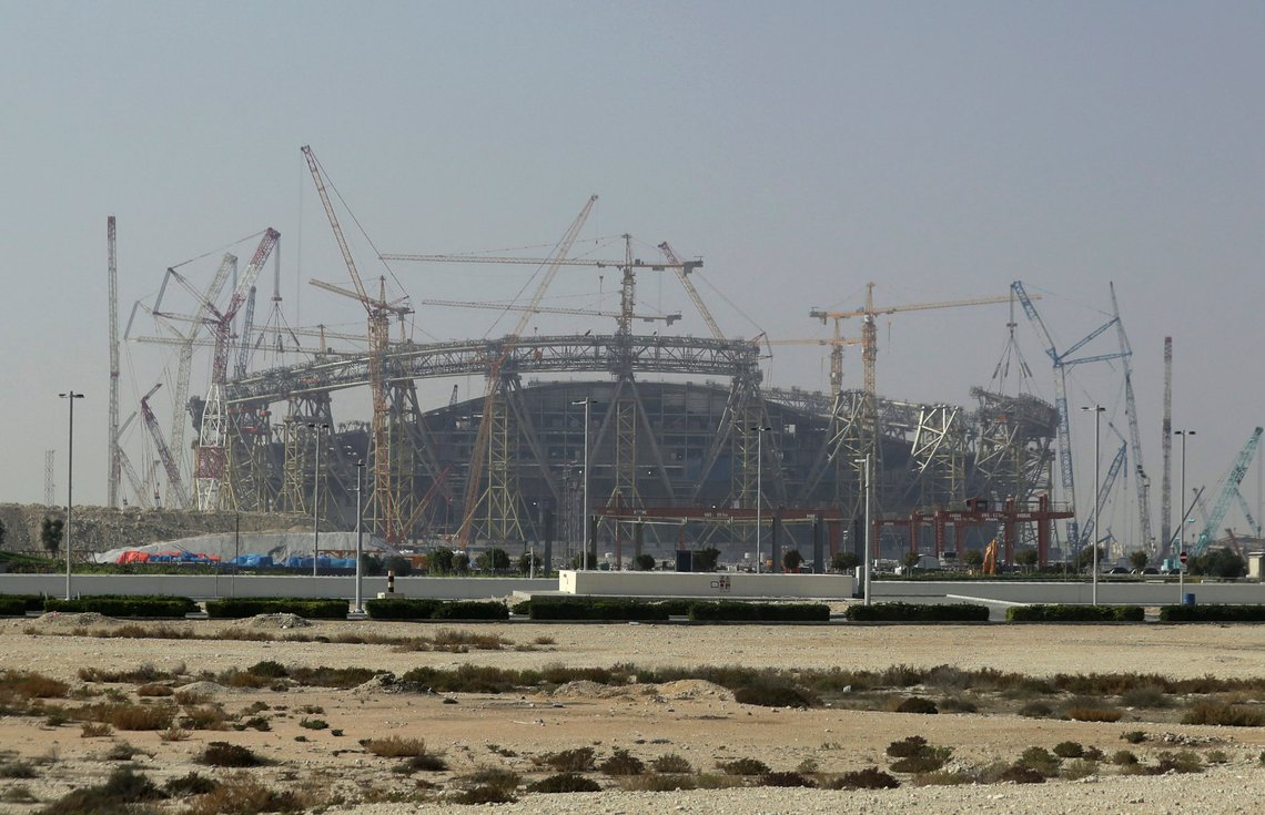 FILE - In this Dec. 20, 2019 file photo, construction is underway at the Lusail Stadium, one of the 2022 World Cup stadiums, in Lusail, Qatar. A U.N. labor body says new labor rules in the energy-rich nation of Qatar effectively dismantles the countrys long-criticized kafala employment system. The International Labor Organization said Sunday, Aug. 30, 2020, that as of now, migrant workers can change jobs before the end of their contracts without obtaining the permission of their current employers. (AP Photo/Hassan Ammar, File) FILE - In this Dec. 20, 2019 file photo, construction is underway at the Lusail Stadium, one of the 2022 World Cup stadiums, in Lusail, Qatar. A U.N. labor body says new labor rules in the energy-rich nation of Qatar effectively dismantles the countrys long-criticized kafala employment system. The International Labor Organization said Sunday, Aug. 30, 2020, that as of now, migrant workers can change jobs before the end of their contracts without obtaining the permission of their current employers. (AP Photo/Hassan Ammar, File)