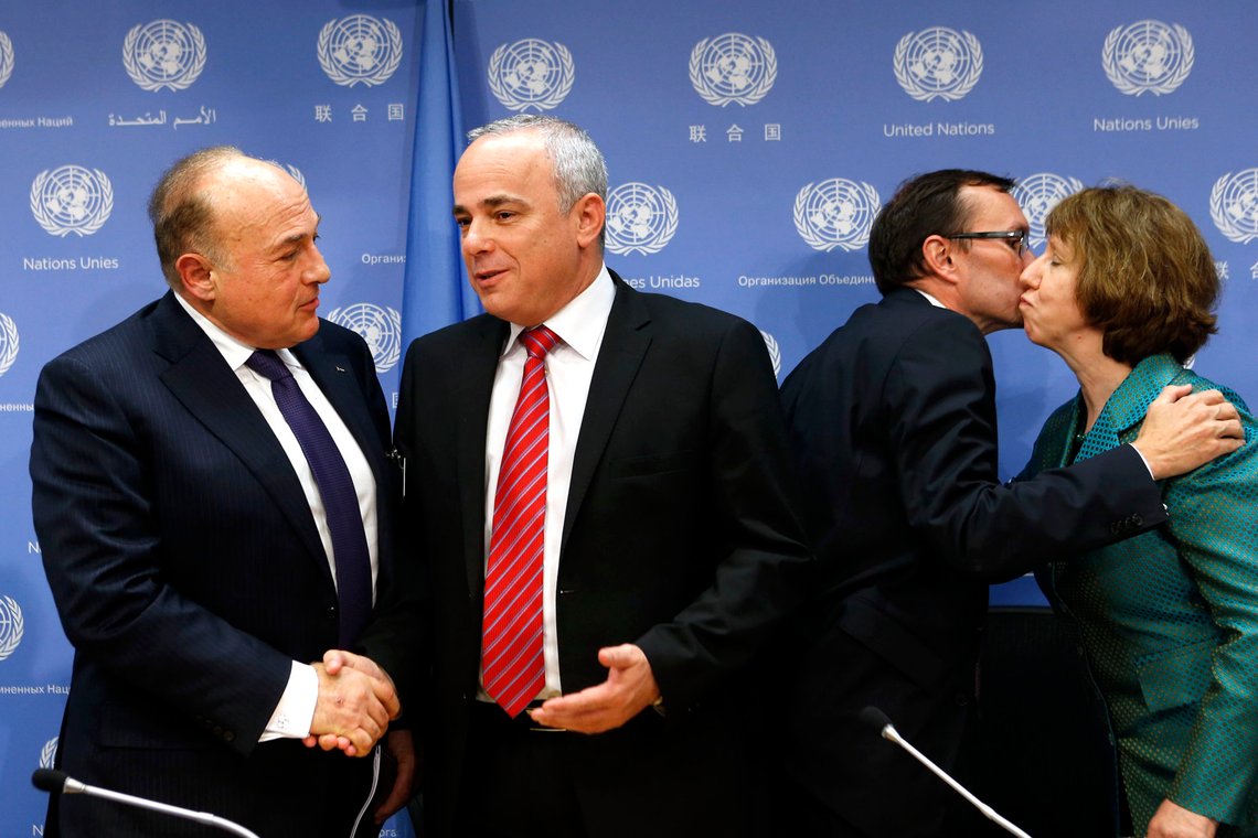 Palestinian Finance Minister Shukri Bishara, left, shakes hands with Israeli Foreign Minister Yuval Steinitz as European Union foreign policy chief Catherine Ashton, right, kisses Norwegian Foreign Minister Espen Barth Eide after a news conference regarding a meeting of the Ad Hoc Liaison Committee during the 68th session of the United Nations General Assembly at U.N. headquarters, Wednesday, Sept. 25, 2013. (AP Photo/Jason DeCrow) Palestinian Finance Minister Shukri Bishara, left, shakes hands with Israeli Foreign Minister Yuval Steinitz as European Union foreign policy chief Catherine Ashton, right, kisses Norwegian Foreign Minister Espen Barth Eide after a news conference regarding a meeting of the Ad Hoc Liaison Committee during the 68th session of the United Nations General Assembly at U.N. headquarters, Wednesday, Sept. 25, 2013. (AP Photo/Jason DeCrow)
