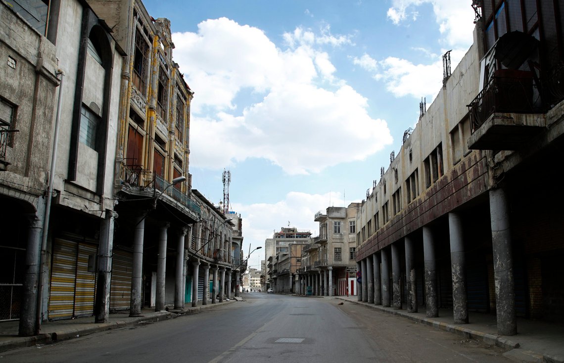 Shops are closed during a curfew to help prevent the spread of the Coronavirus, in the main Shurja market in central Baghdad, Iraq, Friday, Feb. 19, 2021. The curfew runs all day Friday to Sunday, and from 8 p.m. to 5 a.m. the rest of the week. Mosques and schools are closed, large gatherings prohibited, and the wearing of masks and other protective gear will be enforced, according to a statement from the government. (AP Photo/Hadi Mizban) Shops are closed during a curfew to help prevent the spread of the Coronavirus, in the main Shurja market in central Baghdad, Iraq, Friday, Feb. 19, 2021. The curfew runs all day Friday to Sunday, and from 8 p.m. to 5 a.m. the rest of the week. Mosques and schools are closed, large gatherings prohibited, and the wearing of masks and other protective gear will be enforced, according to a statement from the government. (AP Photo/Hadi Mizban)