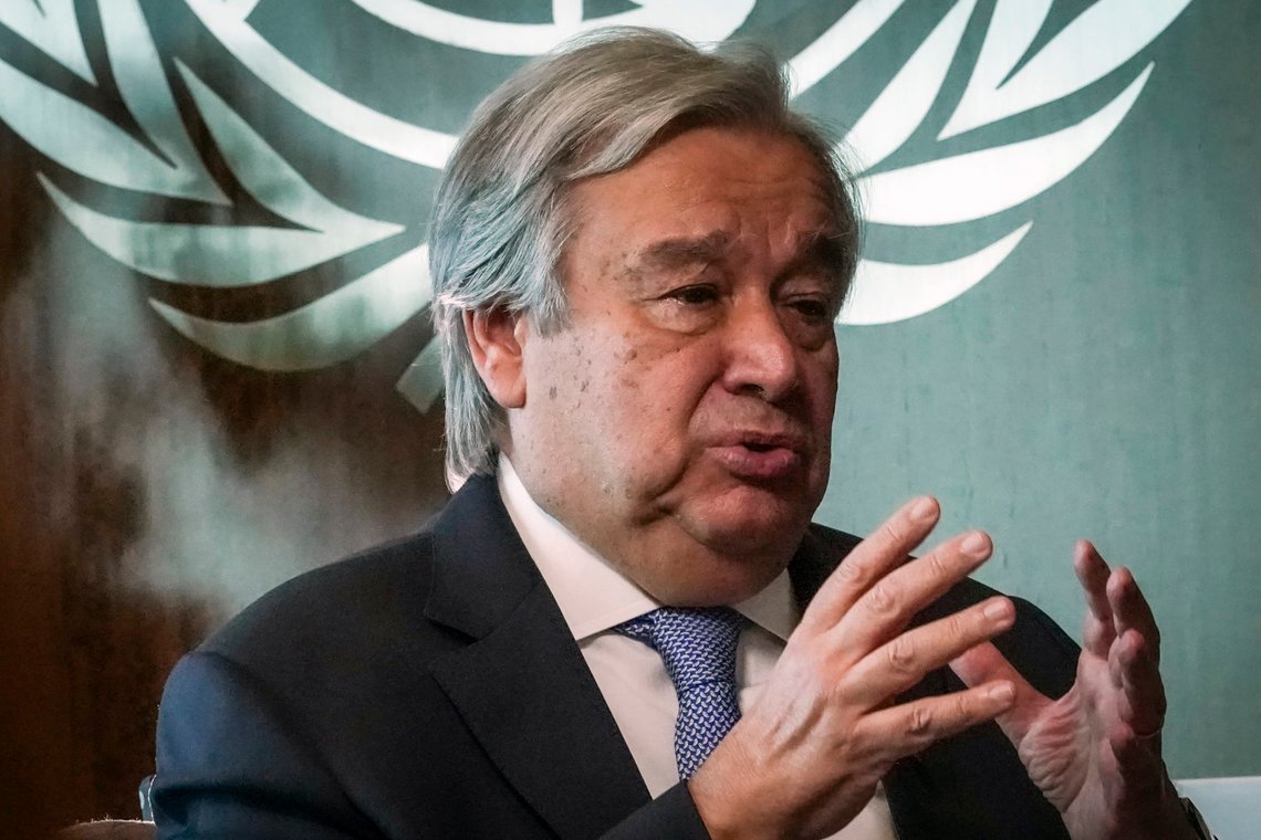 FILE - In this Wednesday Oct. 21, 2020 file photo, United Nations Secretary-General António Guterres speaks during an interview at U.N. headquarters. "I'm alarmed by the growing evidence of accelerating climate destruction and injustice," he told The Associated Press in an email. "But I'm also optimistic by the growing coalition to achieve net zero emissions.... this is a tribute to the resilience of the Paris Agreement." (AP Photo/Bebeto Matthews) FILE - In this Wednesday Oct. 21, 2020 file photo, United Nations Secretary-General António Guterres speaks during an interview at U.N. headquarters. "I'm alarmed by the growing evidence of accelerating climate destruction and injustice," he told The Associated Press in an email. "But I'm also optimistic by the growing coalition to achieve net zero emissions.... this is a tribute to the resilience of the Paris Agreement." (AP Photo/Bebeto Matthews)