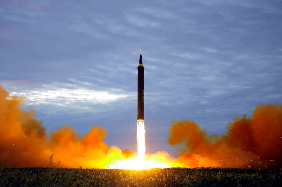 FILE - This Aug. 29, 2017, file photo provided by the North Korean government shows what was said to be the test launch of a Hwasong-12 intermediate range missile in Pyongyang, North Korea. Last year was a disaster for North Korean leader Kim Jong Un, who helplessly watched his country's economy decay amid pandemic border closures while brooding over the collapse of made-for-TV summits with former President Donald Trump that failed to lift sanctions from his country. Now he must start over with President Joe Biden, who has previously called him a thug and accused Trump of chasing spectacles instead of meaningful reductions of Kims nuclear arsenal. (Korean Central News Agency/Korea News Service via AP, File) FILE - This Aug. 29, 2017, file photo provided by the North Korean government shows what was said to be the test launch of a Hwasong-12 intermediate range missile in Pyongyang, North Korea. Last year was a disaster for North Korean leader Kim Jong Un, who helplessly watched his country's economy decay amid pandemic border closures while brooding over the collapse of made-for-TV summits with former President Donald Trump that failed to lift sanctions from his country. Now he must start over with President Joe Biden, who has previously called him a thug and accused Trump of chasing spectacles instead of meaningful reductions of Kims nuclear arsenal. (Korean Central News Agency/Korea News Service via AP, File)