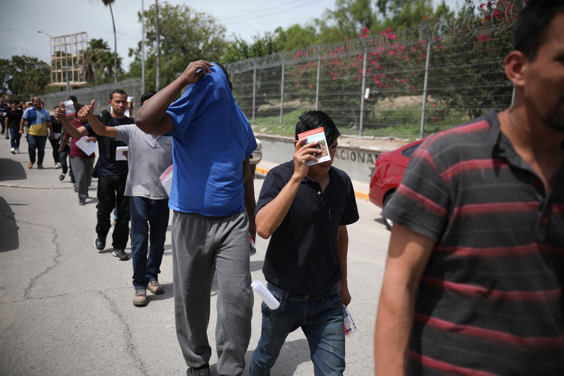 FILE - In this July 31, 2019, file photo, migrants return to Mexico, using the Puerta Mexico bridge that crosses the Rio Grande river in Matamoros, Mexico, on the border with Brownsville, Texas. A federal judge on Tuesday, Jan. 26, 2021, barred the U.S. government from enforcing a 100-day deportation moratorium that is a key immigration priority of President Joe Biden. U.S. District Judge Drew Tipton issued a temporary restraining order sought by Texas, which sued on Friday against a Department of Homeland Security memo that instructed immigration agencies to pause most deportations. Tipton said the Biden administration had failed to provide any concrete, reasonable justification for a 100-day pause on deportations. (AP Photo/Emilio Espejel, File) FILE - In this July 31, 2019, file photo, migrants return to Mexico, using the Puerta Mexico bridge that crosses the Rio Grande river in Matamoros, Mexico, on the border with Brownsville, Texas. A federal judge on Tuesday, Jan. 26, 2021, barred the U.S. government from enforcing a 100-day deportation moratorium that is a key immigration priority of President Joe Biden. U.S. District Judge Drew Tipton issued a temporary restraining order sought by Texas, which sued on Friday against a Department of Homeland Security memo that instructed immigration agencies to pause most deportations. Tipton said the Biden administration had failed to provide any concrete, reasonable justification for a 100-day pause on deportations. (AP Photo/Emilio Espejel, File)