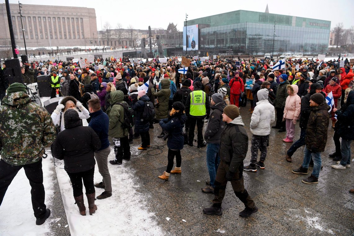 A group of people attend a protest against the Finnish government's regulations to fight the coronavirus pandemic in Helsinki, Saturday, March 20, 2021. Some 400 protesters gathered peacefully in downtown Helsinki. (Antti Aimo-Koivisto/Lehtikuva via AP) A group of people attend a protest against the Finnish government's regulations to fight the coronavirus pandemic in Helsinki, Saturday, March 20, 2021. Some 400 protesters gathered peacefully in downtown Helsinki. (Antti Aimo-Koivisto/Lehtikuva via AP)