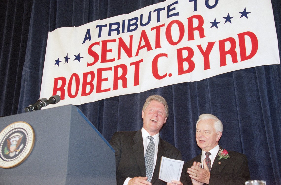 President Bill Clinton and Sen. Robert Byrd, D-W.Va., look at a program at a tribute to Byrd on Sunday, July 17, 1994 in Washington. Clinton called Byrd a leader who uses a legendary devotion to history to honor the institutions of democracy. President Bill Clinton and Sen. Robert Byrd, D-W.Va., look at a program at a tribute to Byrd on Sunday, July 17, 1994 in Washington. Clinton called Byrd a leader who uses a legendary devotion to history to honor the institutions of democracy.