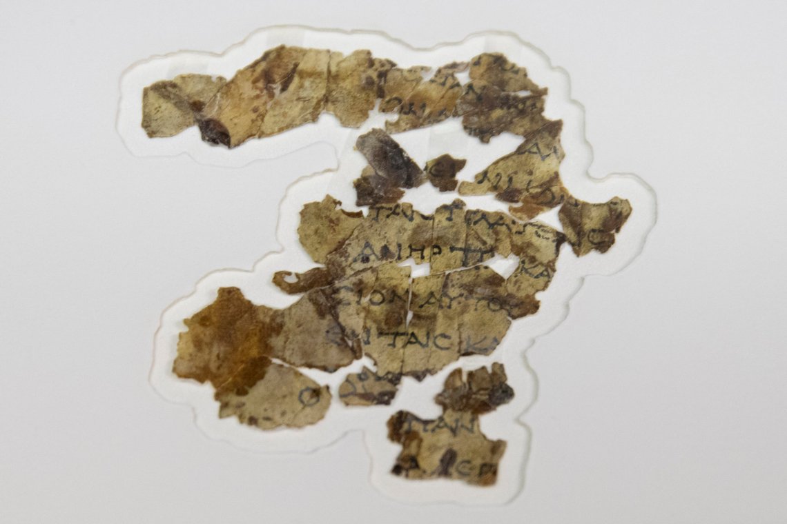 The Israel Antiquities Authority displays newly discovered Dead Sea Scroll fragments at the Dead Sea scrolls conservation lab in Jerusalem, Tuesday, March 16, 2021. Israeli archaeologists on Tuesday announced the discovery of dozens of new Dead Sea Scroll fragments bearing a biblical text found in a desert cave and believed hidden during a Jewish revolt against Rome nearly 1,900 years ago. (AP Photo/Sebastian Scheiner) The Israel Antiquities Authority displays newly discovered Dead Sea Scroll fragments at the Dead Sea scrolls conservation lab in Jerusalem, Tuesday, March 16, 2021. Israeli archaeologists on Tuesday announced the discovery of dozens of new Dead Sea Scroll fragments bearing a biblical text found in a desert cave and believed hidden during a Jewish revolt against Rome nearly 1,900 years ago. (AP Photo/Sebastian Scheiner)