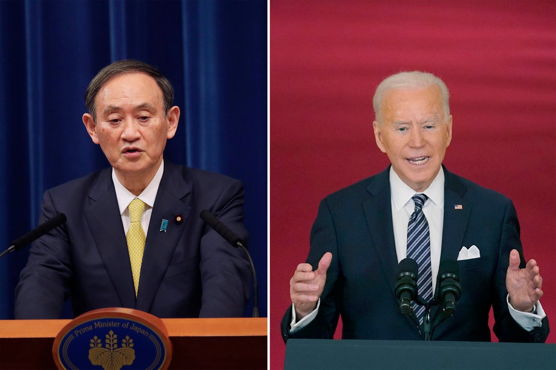 This combination photo, Japanese Prime Minister Yoshihide Suga speaking in Tokyo on Dec. 4, 2020 and U.S. President Joe Biden speaking at the White House in Washington on March 11, 2021. Japan's government announced Friday, March 12, 2021 that Suga will travel to Washington next month for his first face-to-face summit with Biden after he and his entourage complete their COVID-19 vaccinations. (AP
Photo, File) This combination photo, Japanese Prime Minister Yoshihide Suga speaking in Tokyo on Dec. 4, 2020 and U.S. President Joe Biden speaking at the White House in Washington on March 11, 2021. Japan's government announced Friday, March 12, 2021 that Suga will travel to Washington next month for his first face-to-face summit with Biden after he and his entourage complete their COVID-19 vaccinations. (AP
Photo, File)