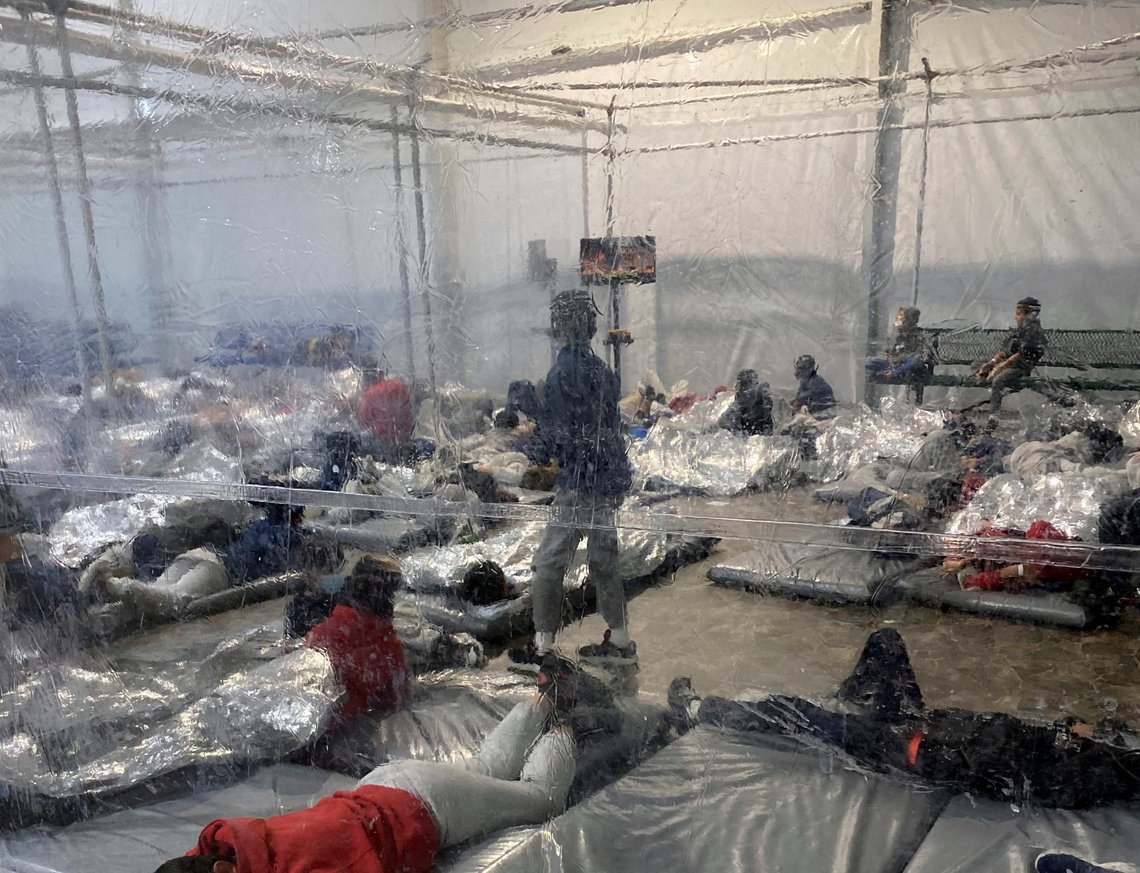 This March 20, 2021, photo provided by the Office of Rep. Henry Cuellar, D-Texas, shows detainees in a Customs and Border Protection (CBP) temporary overflow facility in Donna, Texas. President Joe Biden's administration faces mounting criticism for refusing to allow outside observers into facilities where it is detaining thousands of immigrant children. (Photo courtesy of the Office of Rep. Henry Cuellar via AP) This March 20, 2021, photo provided by the Office of Rep. Henry Cuellar, D-Texas, shows detainees in a Customs and Border Protection (CBP) temporary overflow facility in Donna, Texas. President Joe Biden's administration faces mounting criticism for refusing to allow outside observers into facilities where it is detaining thousands of immigrant children. (Photo courtesy of the Office of Rep. Henry Cuellar via AP)