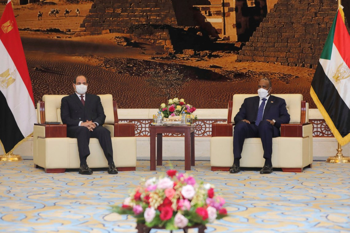 Egyptian President Abdel Fattah al-Sisi meets Chairman of the Sovereignty Council of Sudan Gen. Abdel Fattah Abdelrahman al-Burhan at the Presidential Palace in Khartoum, Sudan, Saturday, March. 6, 2021. Egypt's presidency says President Abdel Fattah el-Sissi trip was to address an array of issues, including economic and military ties and the two nations dispute with Ethiopia over a massive dam Addis Ababa is building on the Blue Nile. The visit comes amid a rapprochement between the two governments. (Presidency of Sudan via AP) Egyptian President Abdel Fattah al-Sisi meets Chairman of the Sovereignty Council of Sudan Gen. Abdel Fattah Abdelrahman al-Burhan at the Presidential Palace in Khartoum, Sudan, Saturday, March. 6, 2021. Egypt's presidency says President Abdel Fattah el-Sissi trip was to address an array of issues, including economic and military ties and the two nations dispute with Ethiopia over a massive dam Addis Ababa is building on the Blue Nile. The visit comes amid a rapprochement between the two governments. (Presidency of Sudan via AP)