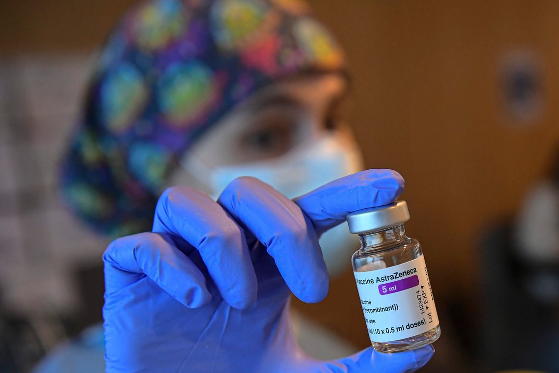 FILE - In this Wednesday, March 24, 2021, file photo, a health worker holds a dose of the AstraZeneca COVID-19 vaccine, during a mass vaccination campaign at San Pedro Hospital, in Logrono, northern Spain. AstraZeneca says that its COVID-19 vaccine is strongly effective even after counting additional illnesses in its U.S. study. The announcement late Wednesday was the latest in an extraordinary public dispute with American officials. (AP Photo/Alvaro Barrientos, File) FILE - In this Wednesday, March 24, 2021, file photo, a health worker holds a dose of the AstraZeneca COVID-19 vaccine, during a mass vaccination campaign at San Pedro Hospital, in Logrono, northern Spain. AstraZeneca says that its COVID-19 vaccine is strongly effective even after counting additional illnesses in its U.S. study. The announcement late Wednesday was the latest in an extraordinary public dispute with American officials. (AP Photo/Alvaro Barrientos, File)