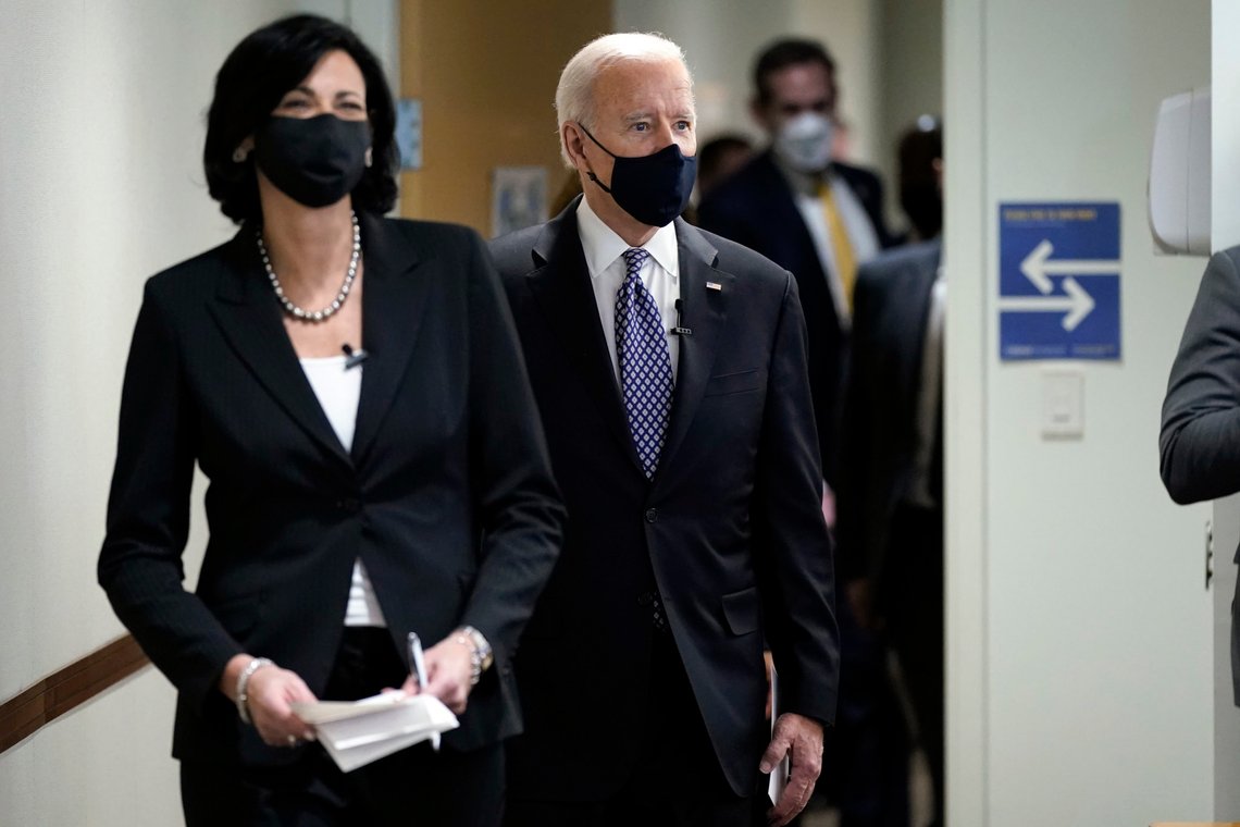 In this March 19, 2021, photo, Dr. Rochelle Walensky, director of the Centers for Disease Control and Prevention, leads President Joe Biden into the room for a COVID-19 briefing at the headquarters for the CDC Atlanta. Walensky is making an impassioned plea to Americans not to let their guard down in the fight against COVID-19. She warned on March 29 of a potential fourth wave of the virus. (AP Photo/Patrick Semansky) In this March 19, 2021, photo, Dr. Rochelle Walensky, director of the Centers for Disease Control and Prevention, leads President Joe Biden into the room for a COVID-19 briefing at the headquarters for the CDC Atlanta. Walensky is making an impassioned plea to Americans not to let their guard down in the fight against COVID-19. She warned on March 29 of a potential fourth wave of the virus. (AP Photo/Patrick Semansky)